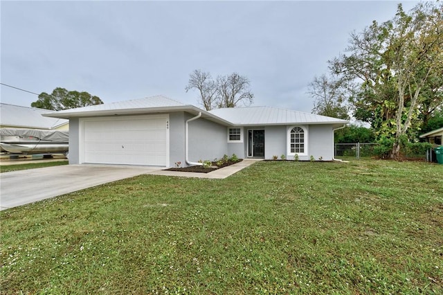 single story home featuring a garage and a front lawn