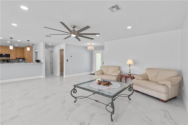 living room with ceiling fan