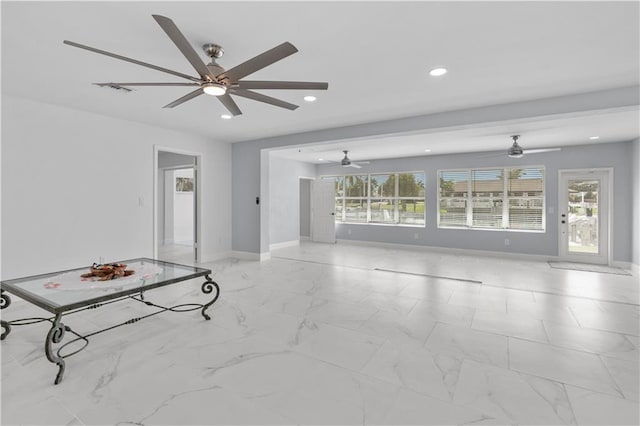 unfurnished living room featuring a healthy amount of sunlight