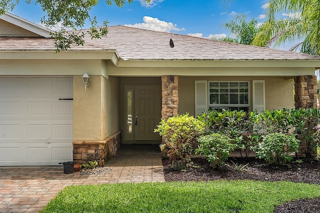 property entrance featuring a garage