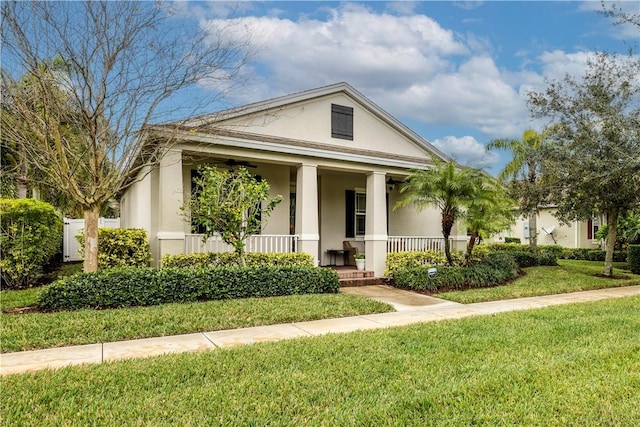 view of front of house featuring a porch and a front yard