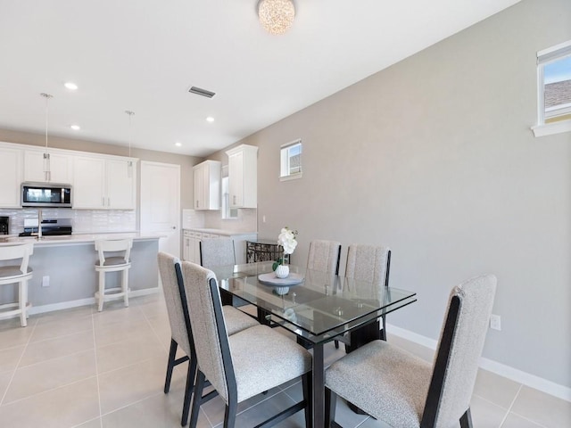 view of tiled dining space