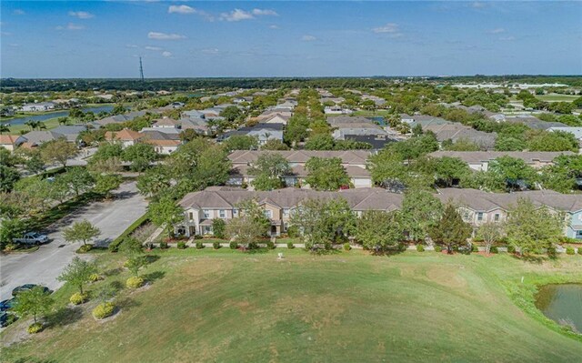 1544 Par Ct, Vero Beach, FL 32966 - aerial overview of property's location with nearby suburban area, a golf club, and a large body of water