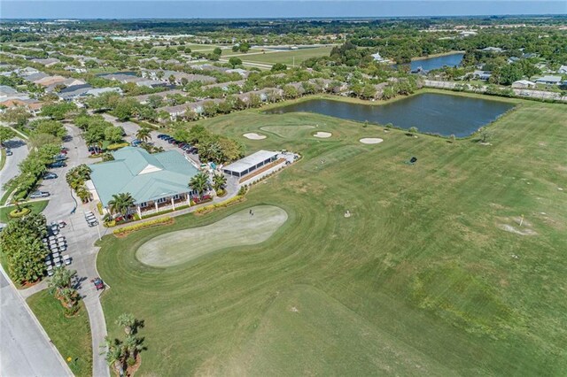 1544 Par Ct, Vero Beach, FL 32966 - aerial view of property's location with a large body of water, a golf course, and nearby suburban area