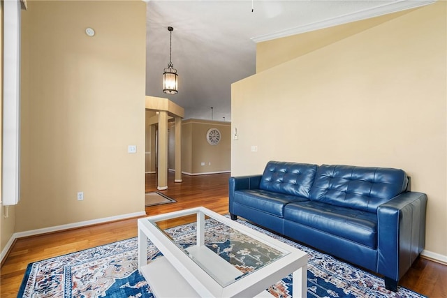 living room featuring wood finished floors and baseboards