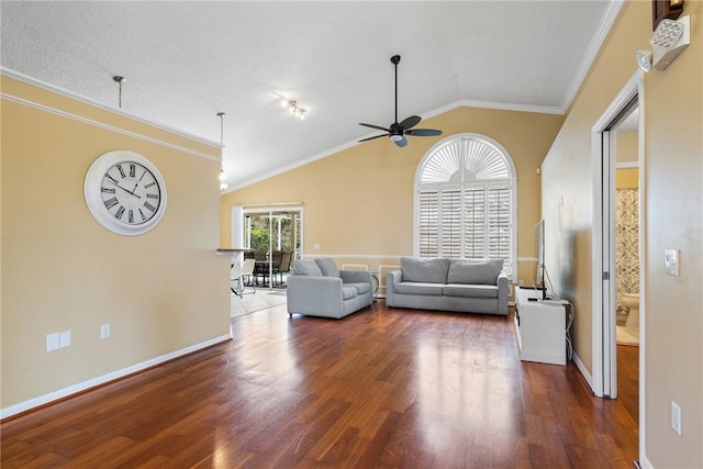living room featuring baseboards, a ceiling fan, wood finished floors, and lofted ceiling