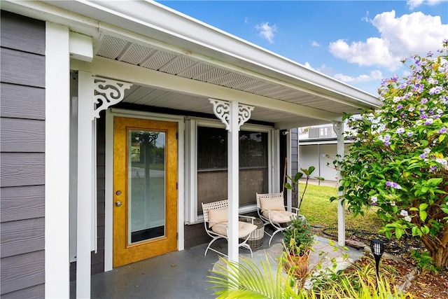 doorway to property featuring a patio area