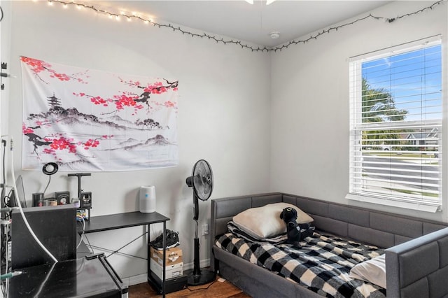 bedroom with wood-type flooring