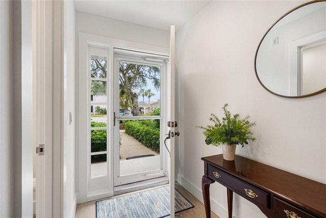 doorway featuring light hardwood / wood-style floors