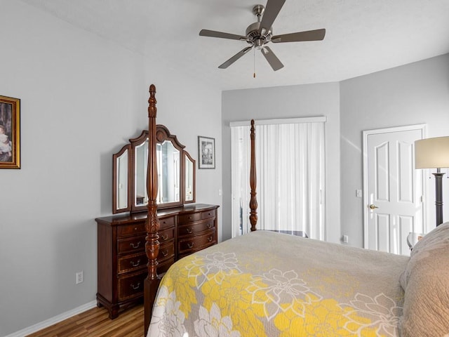 bedroom with light hardwood / wood-style flooring and ceiling fan