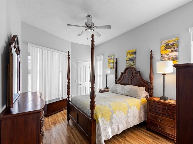 bedroom featuring ceiling fan and light wood-type flooring