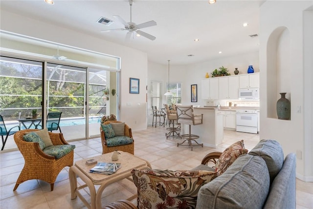 living room with ceiling fan