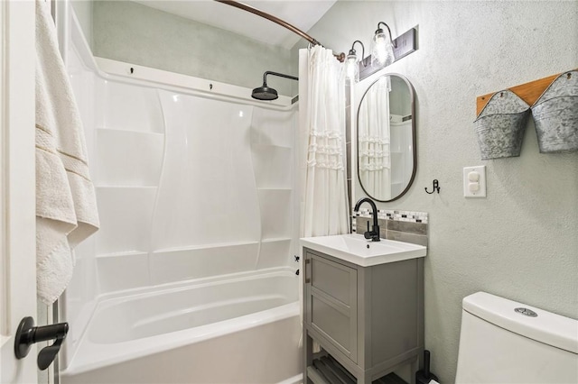 full bathroom with vanity, toilet, and shower / bath combo