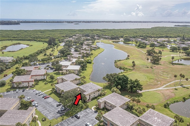 birds eye view of property featuring a water view