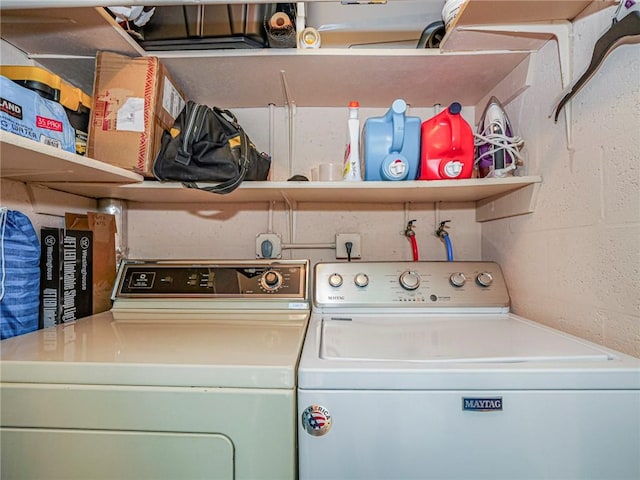 washroom with independent washer and dryer