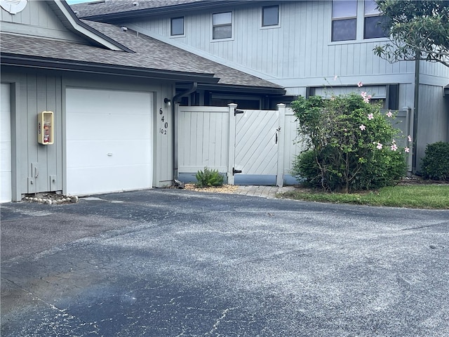 exterior space with a garage