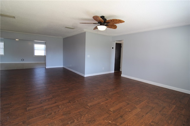 unfurnished room featuring ceiling fan, crown molding, a textured ceiling, and dark hardwood / wood-style flooring