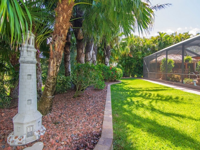 view of yard featuring a lanai