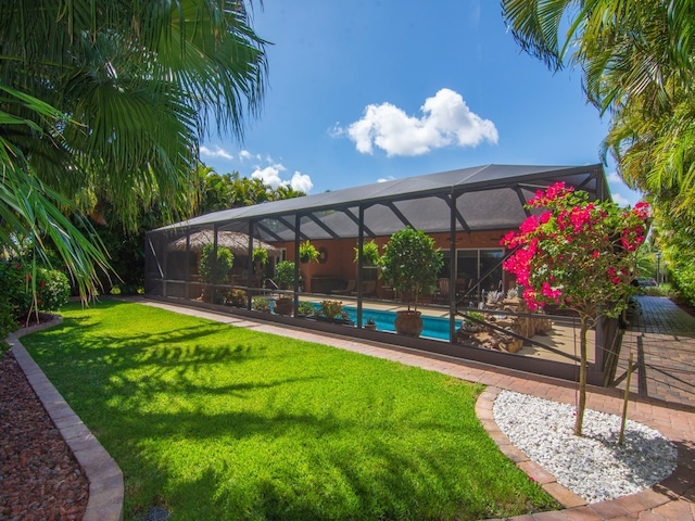 view of yard with a lanai