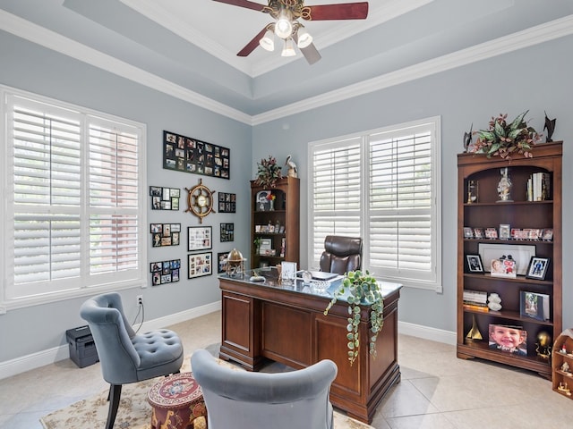 office featuring light tile patterned floors, a raised ceiling, ceiling fan, and ornamental molding