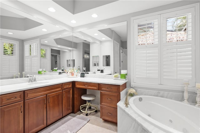 bathroom with vanity, tiled bath, and tile patterned floors