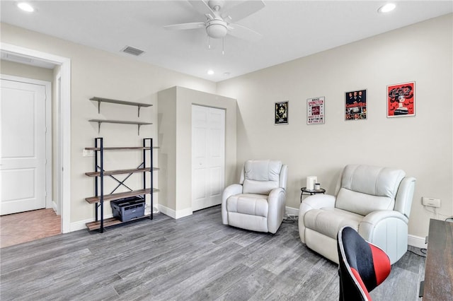 777 Fortunella Cir SW, Vero Beach, FL 32968 - sitting room with visible vents, wood finished floors, recessed lighting, baseboards, and ceiling fan
