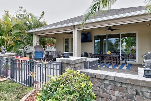 777 Fortunella Cir SW, Vero Beach, FL 32968 - view of patio / terrace with an outdoor living space, outdoor dining space, a ceiling fan, and fence