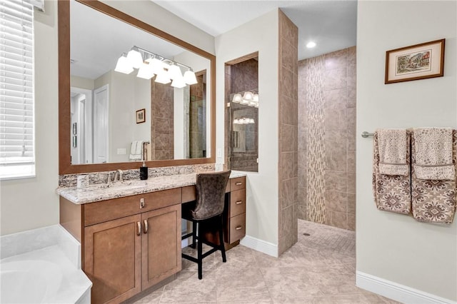 777 Fortunella Cir SW, Vero Beach, FL 32968 - bathroom featuring a bath, a walk in shower, vanity, and baseboards