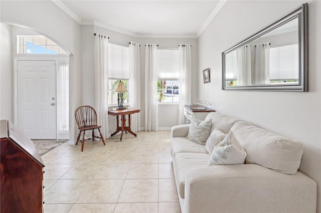 living area featuring light tile patterned flooring, crown molding, and baseboards