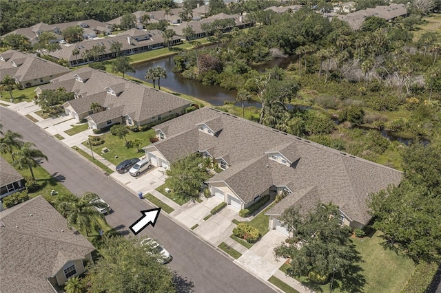679 5th Ave, Vero Beach, FL 32962 - drone / aerial view featuring a water view and a residential view