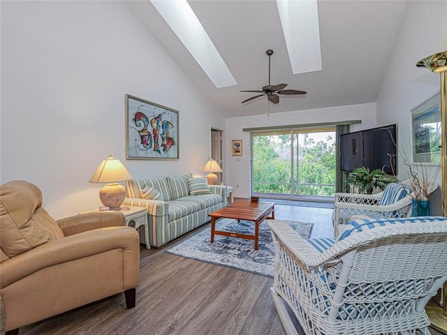 679 5th Ave, Vero Beach, FL 32962 - living room featuring a skylight, high vaulted ceiling, wood finished floors, and a ceiling fan