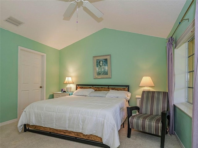 679 5th Ave, Vero Beach, FL 32962 - bedroom featuring light carpet, visible vents, baseboards, and vaulted ceiling