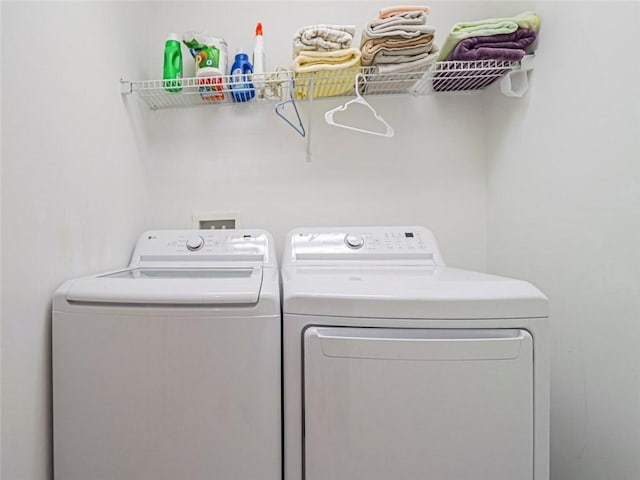 679 5th Ave, Vero Beach, FL 32962 - washroom with washer and dryer and laundry area