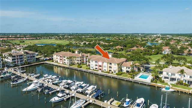 birds eye view of property featuring a water view