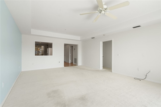 carpeted empty room with ceiling fan