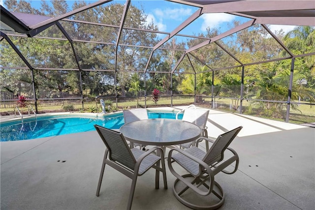 view of swimming pool with a patio area