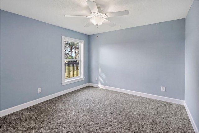 carpeted empty room with ceiling fan