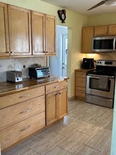 857 Dolores St, Sebastian, FL 32958 - kitchen with stainless steel appliances