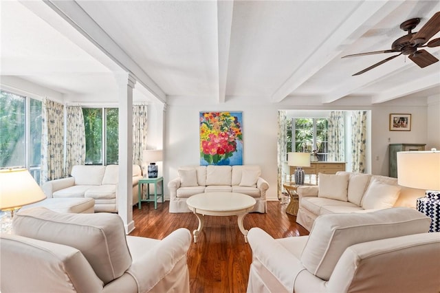 1300 Ivy Ct Unit 209, Vero Beach, FL 32963 - living room featuring beamed ceiling, a ceiling fan, wood finished floors, and baseboards