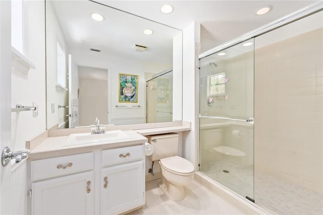 1300 Ivy Ct Unit 209, Vero Beach, FL 32963 - bathroom featuring a stall shower, toilet, recessed lighting, vanity, and tile patterned floors