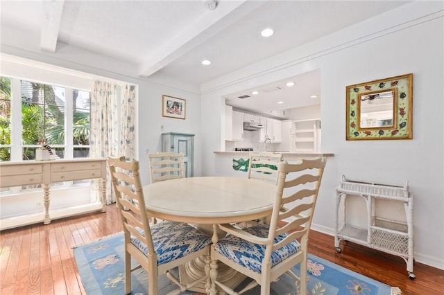 1300 Ivy Ct Unit 209, Vero Beach, FL 32963 - dining area with beam ceiling, light wood-type flooring, baseboards, and recessed lighting