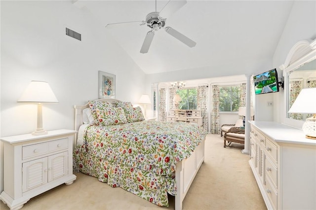 1300 Ivy Ct Unit 209, Vero Beach, FL 32963 - bedroom featuring light colored carpet, high vaulted ceiling, and a ceiling fan