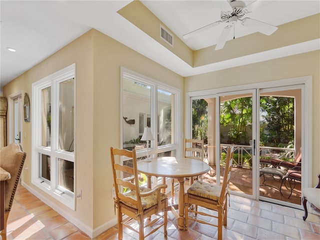 sunroom / solarium with ceiling fan