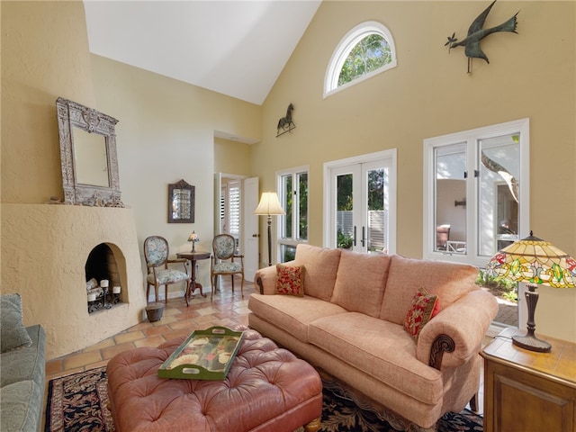 living room with high vaulted ceiling