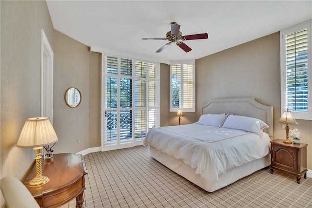 601 N Swim Club Dr Unit 3A, Vero Beach, FL 32963 - bedroom with baseboards and a ceiling fan