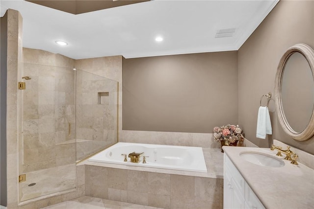 601 N Swim Club Dr Unit 3A, Vero Beach, FL 32963 - full bath featuring a garden tub, vanity, a stall shower, and recessed lighting