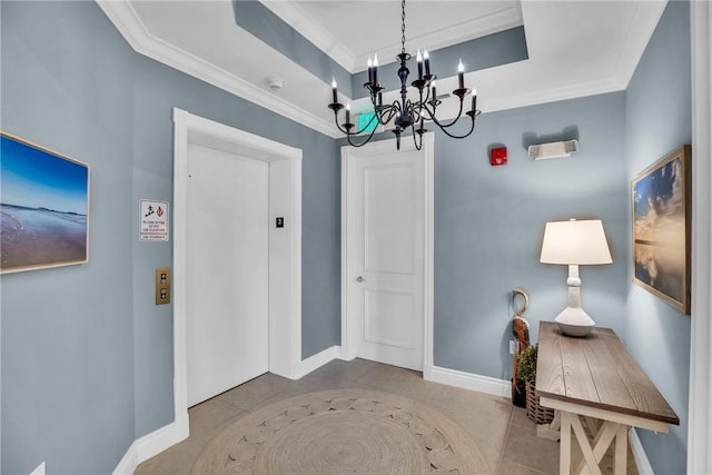 601 N Swim Club Dr Unit 3A, Vero Beach, FL 32963 - entryway featuring crown molding, a chandelier, a tray ceiling, and tile patterned floors