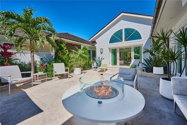 view of patio / terrace with a fire pit