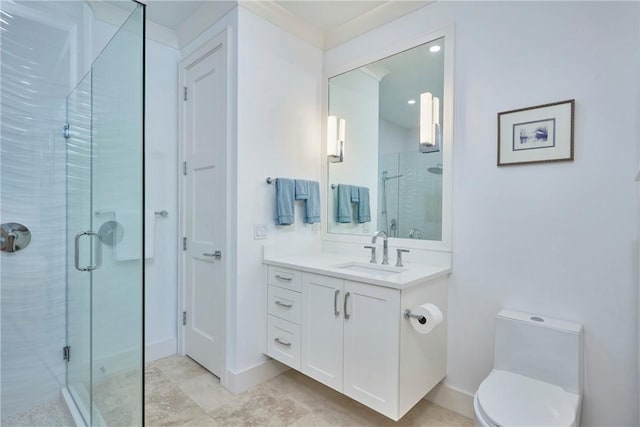 bathroom featuring baseboards, toilet, a stall shower, and vanity