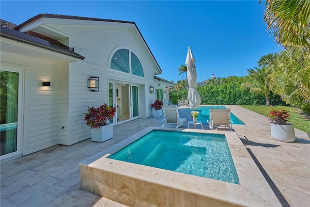 pool featuring a patio